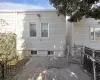 Back of house with a patio and fence