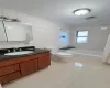 Full bathroom featuring visible vents, toilet, shower / tub combination, tile walls, and tile patterned flooring