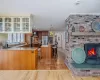 Dining area with light wood-style flooring, plenty of natural light, recessed lighting, and baseboards