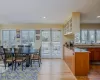 Dining space featuring visible vents, recessed lighting, french doors, and light wood-style floors