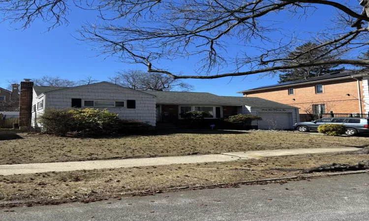 View of front of house with an attached garage