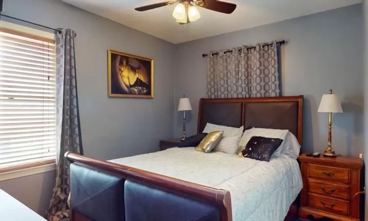 Bedroom with a ceiling fan