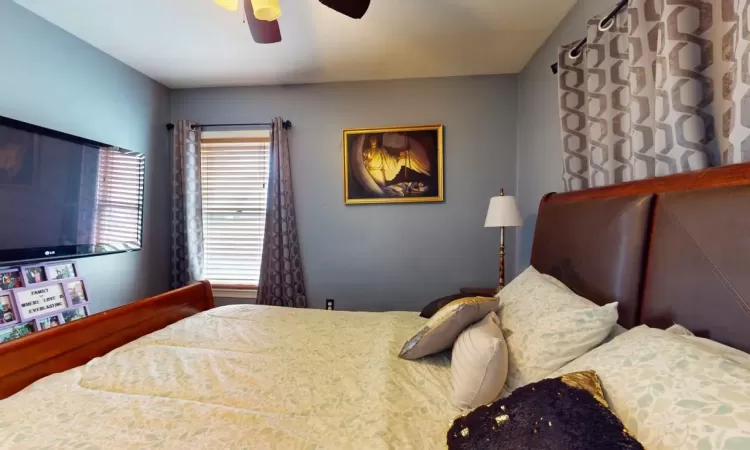 Bedroom featuring a ceiling fan