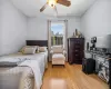 Bedroom featuring light wood-type flooring and a ceiling fan