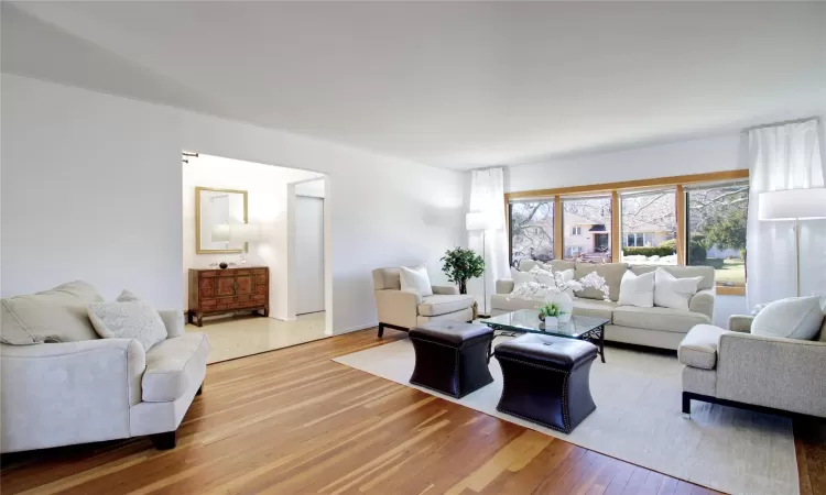 Living room featuring light wood-style floors