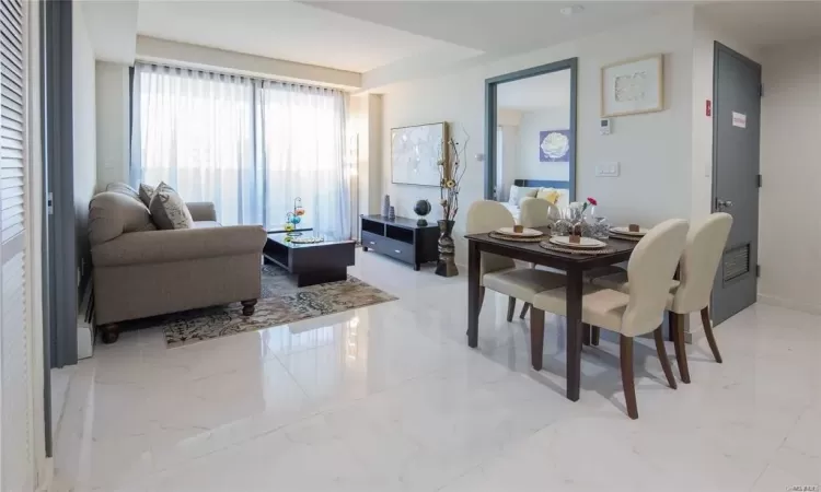 Dining room with marble finish floor