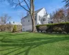 View of side yard and side of home.