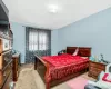 Bedroom with light colored carpet