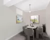 Dining space featuring baseboards and tile patterned flooring