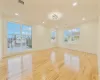 Unfurnished room featuring light hardwood / wood-style floors and ornamental molding