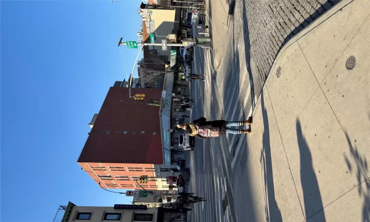 View of street featuring curbs and sidewalks