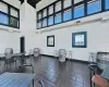 View of patio featuring visible vents and outdoor dining space