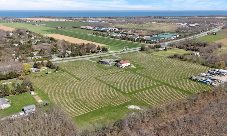 Birds eye view of property with a rural view