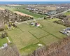 Birds eye view of property with a rural view