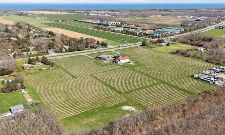 Birds eye view of property with a rural view