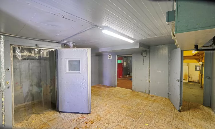 Finished basement with tile patterned floors