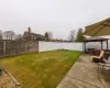 View of yard featuring a gazebo, a fenced backyard, outdoor lounge area, and a patio