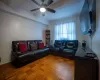 Living room featuring ceiling fan