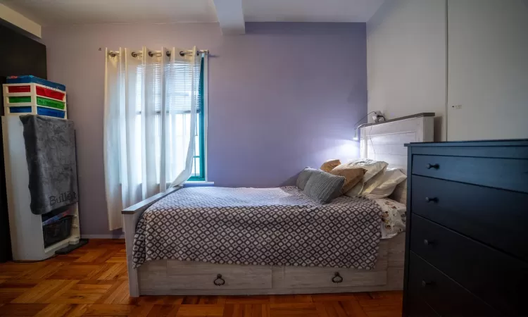 Bedroom featuring beamed ceiling